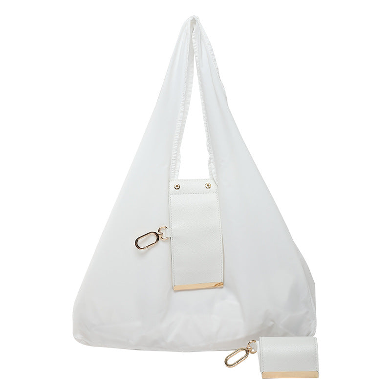 LAST DAY BUY 1 GET 1 FREE🎁-Tiny as a Keychain, Holds Up to 30 lbs! The Ultimate Everyday Foldaway